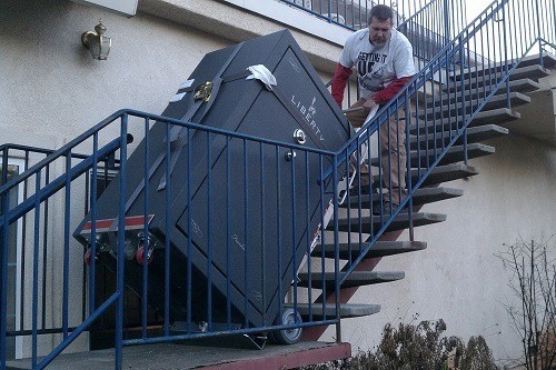 Man Moving Big Gun Safe