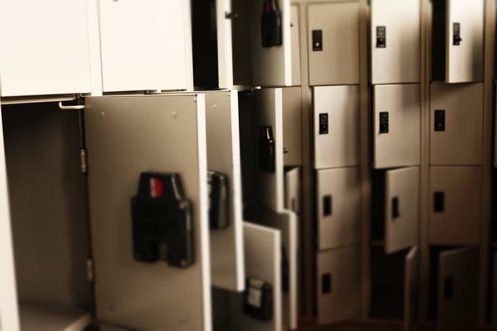 Wall of beige vaults for gun storage
