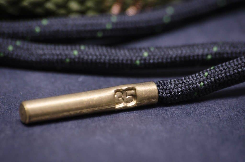 Close up of a bore snake brass weight