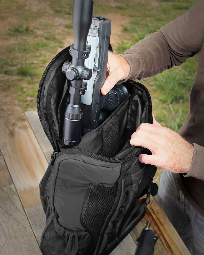 Inserting a gun into a bag