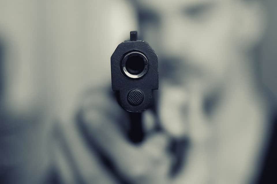 Gun pointing at camera