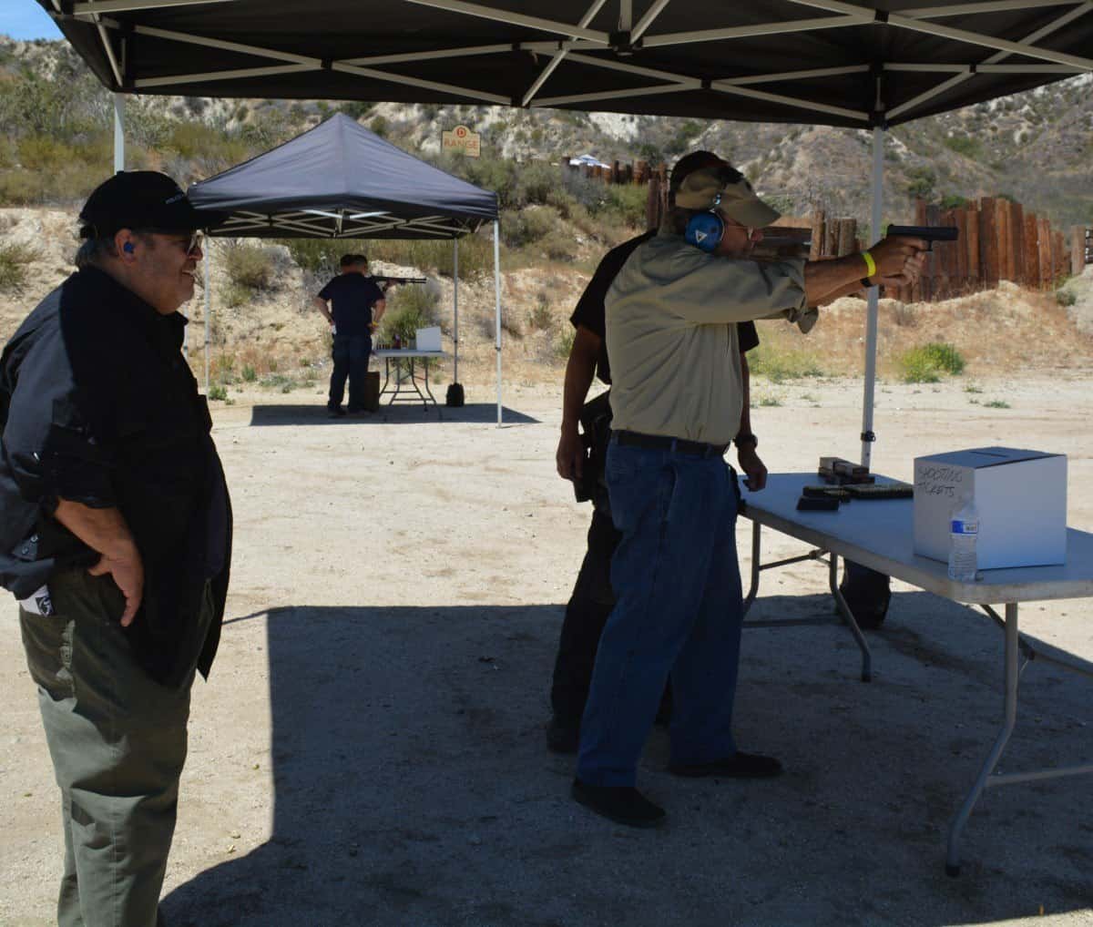 Man using handgun in shooting range