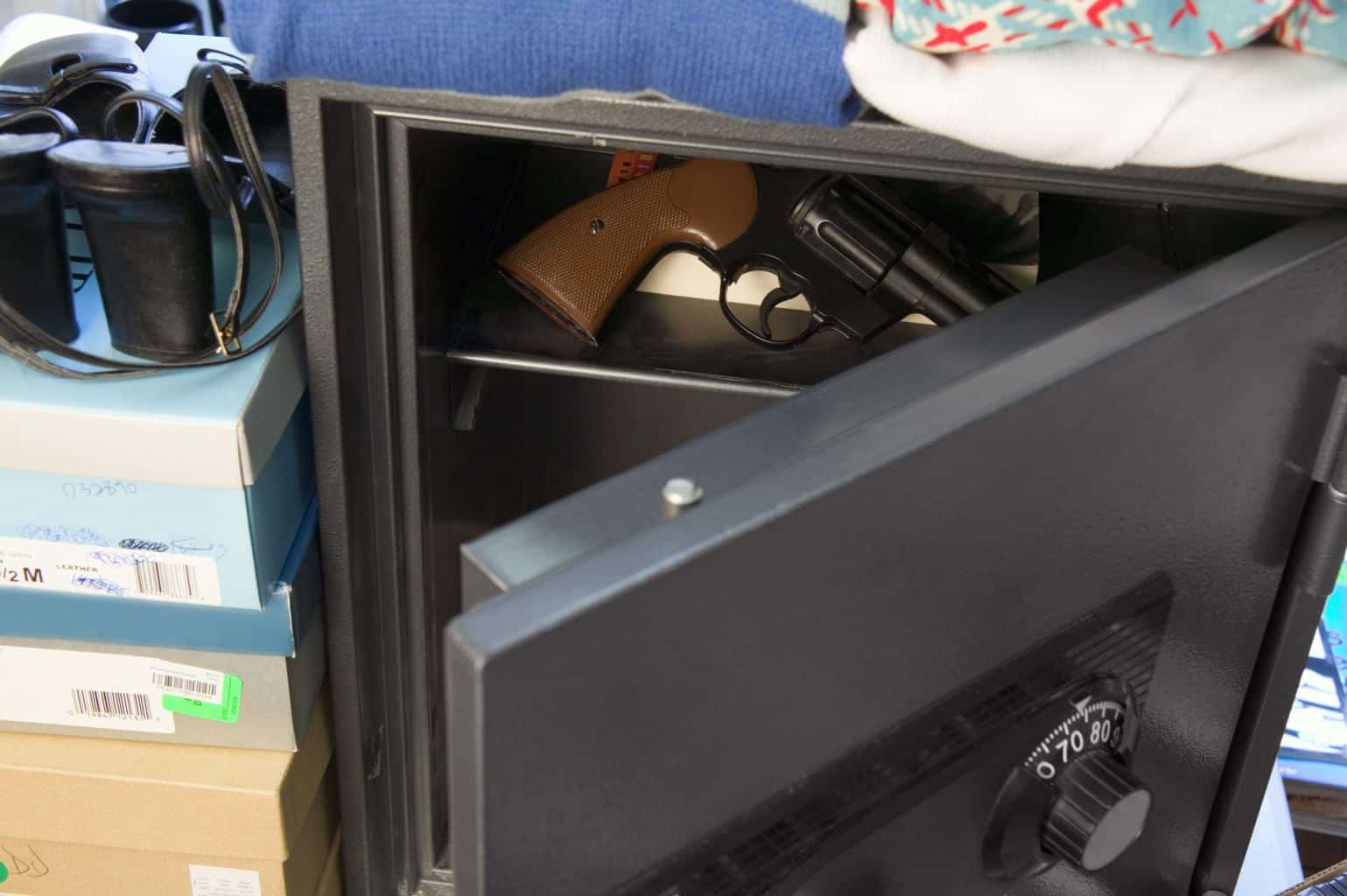 Gun visible inside an opened gun safe