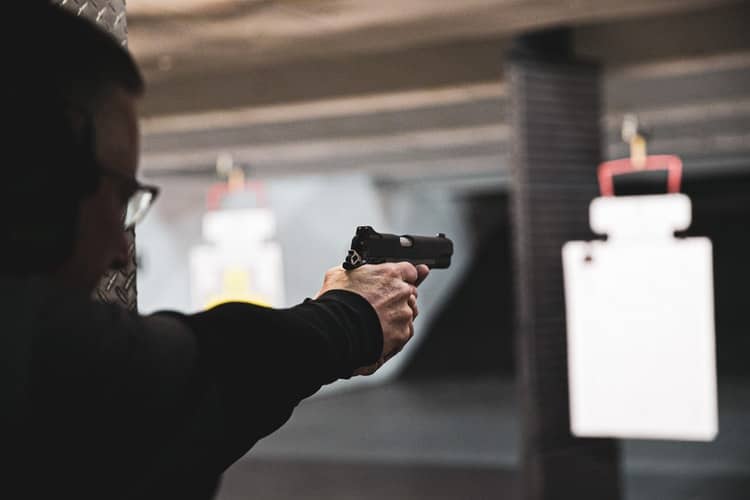 Man doing practice shooting in a North Carolina gun range