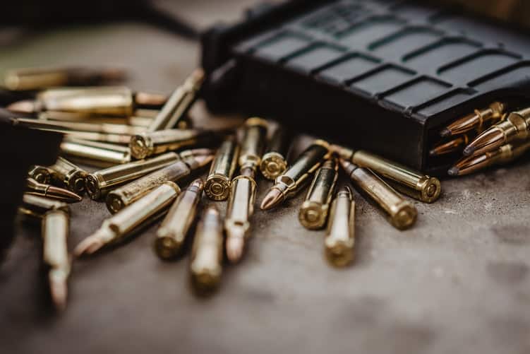 Dozens of ammunition scattered on a table