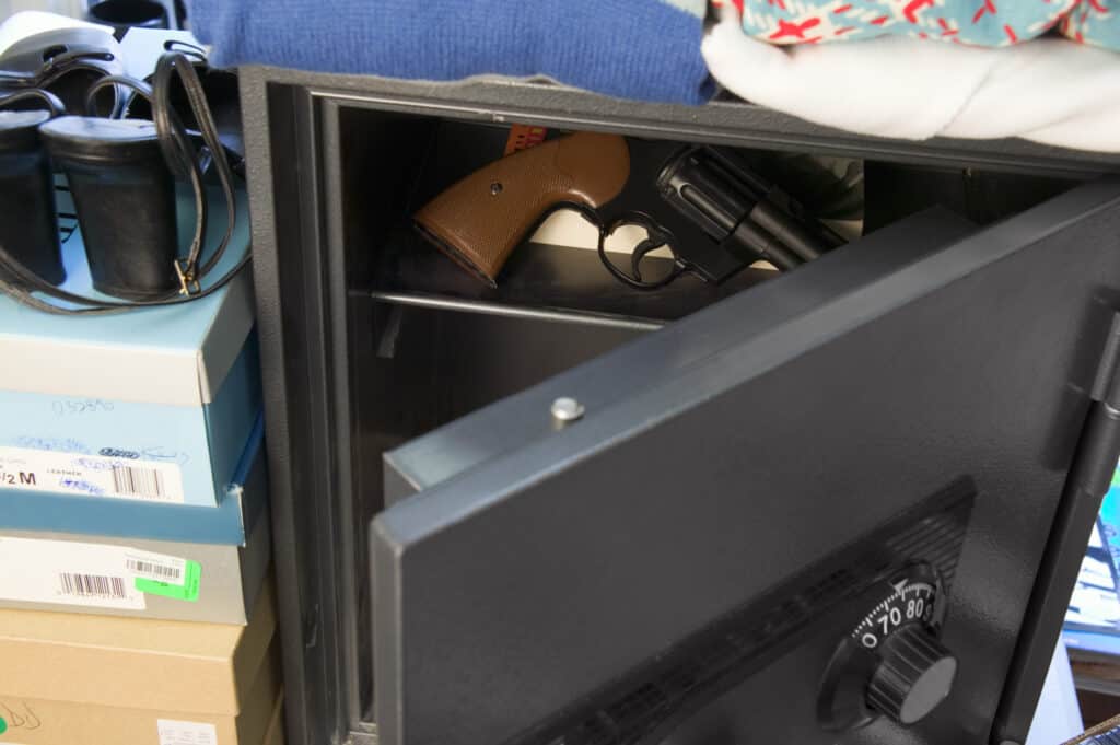 Man learning why it is essential to put a dehumidifier in a gun safe