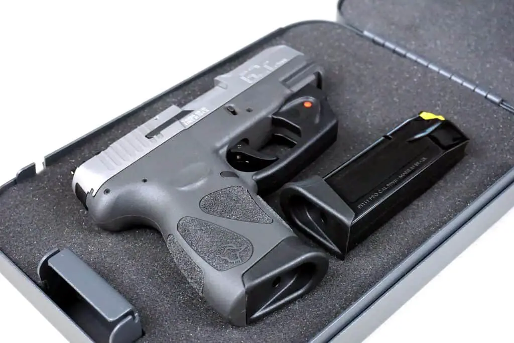 Silver pistol on a gun case