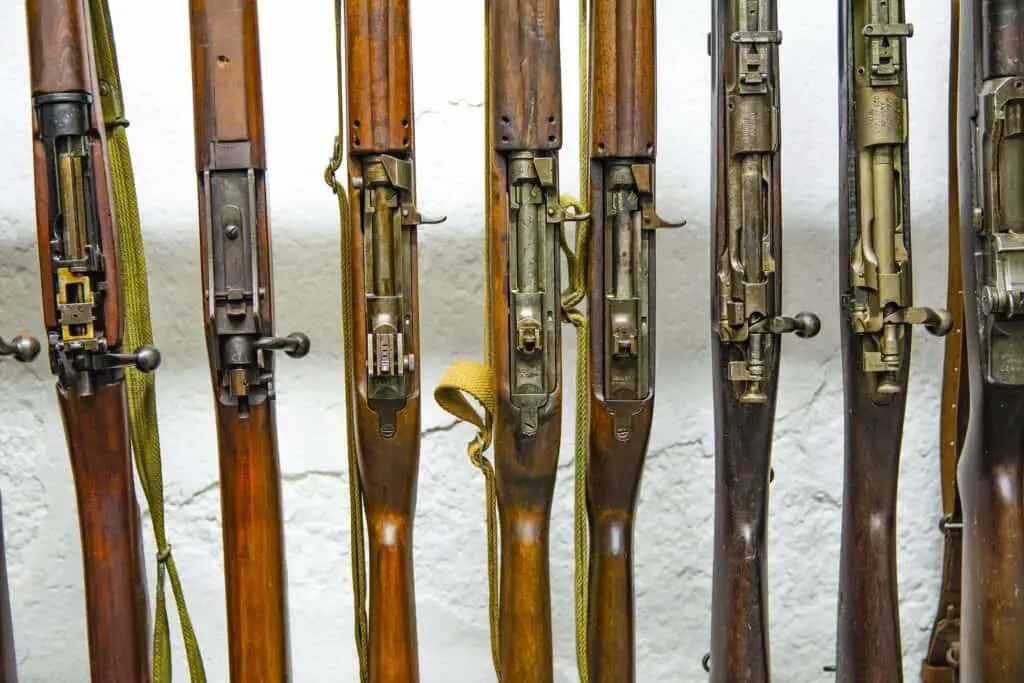 Rifles resting on a wall