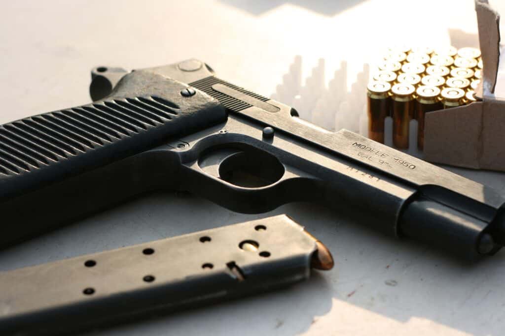 Handgun and a box of bullets