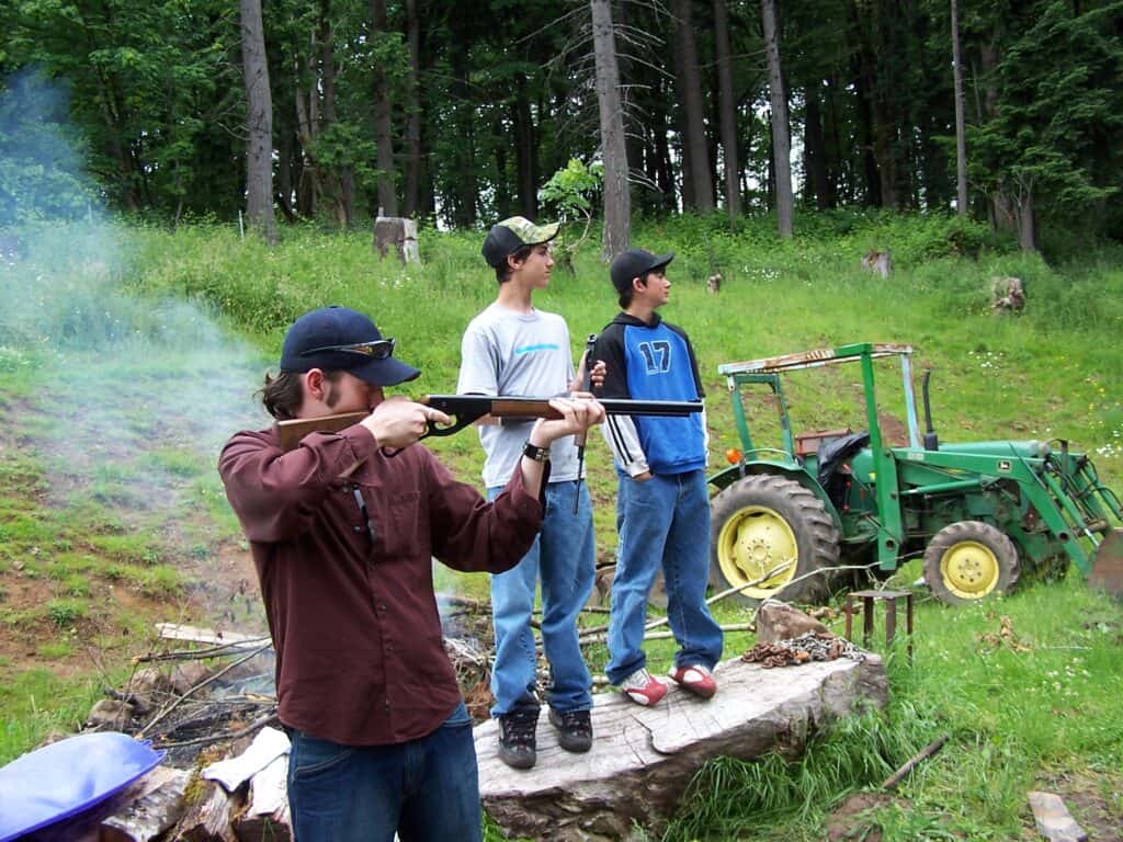 Group of boys practicing their gun shooting skills at a gun range in Texas