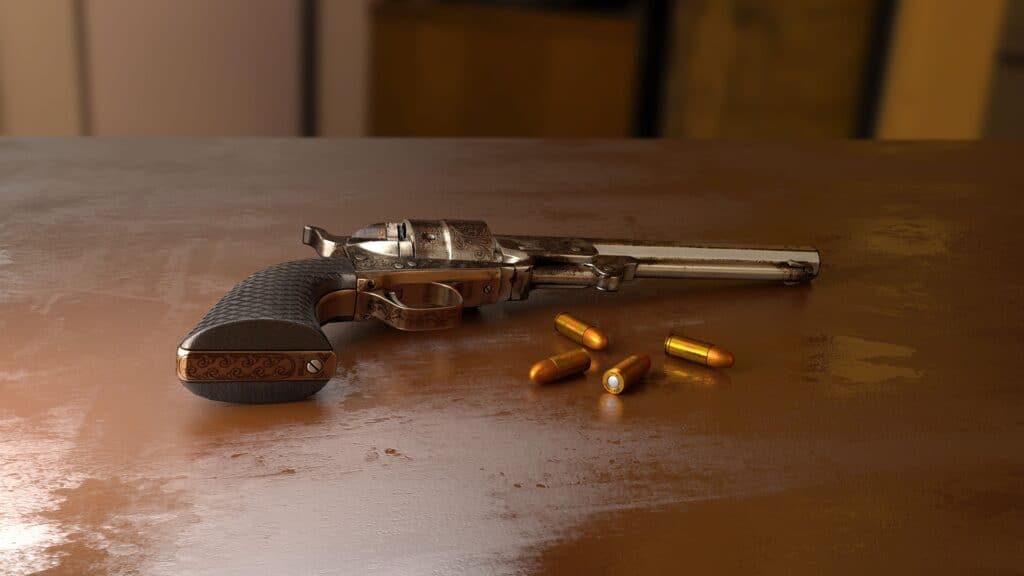 Handgun and bullets on a table