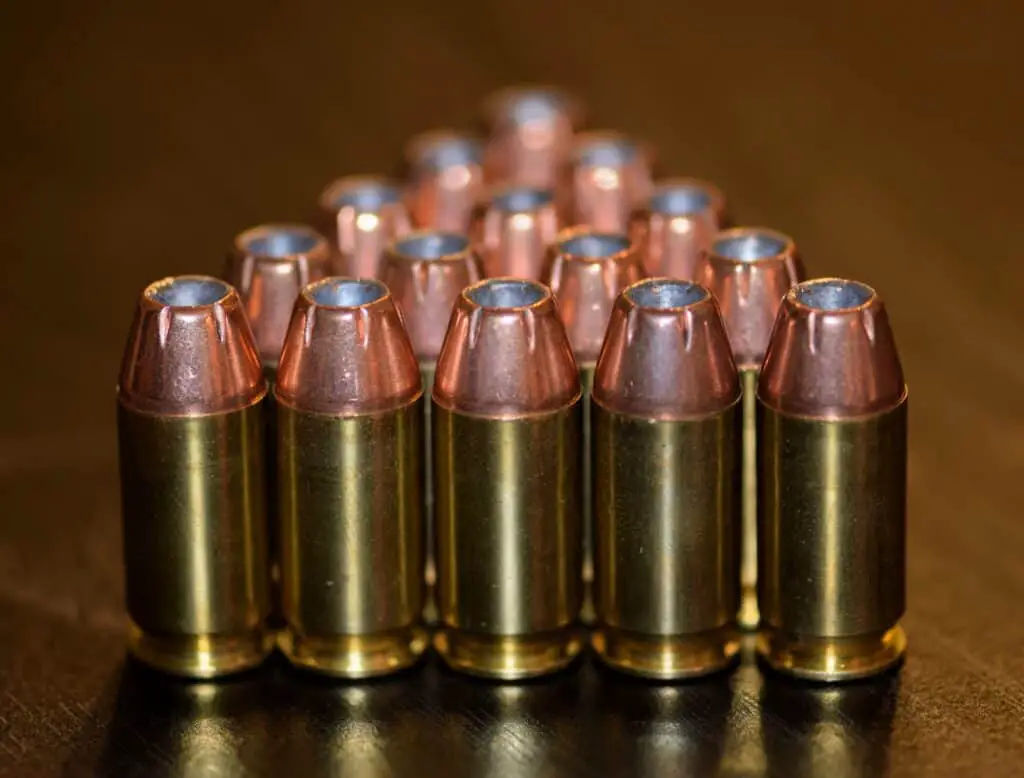 Dozen bullets on a table