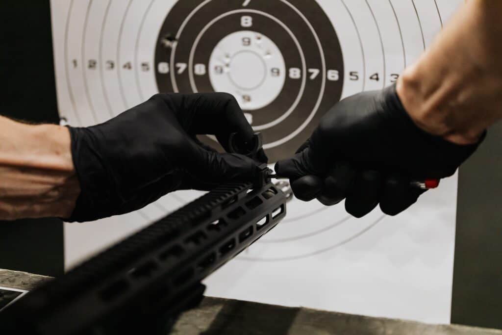 Person preparing to shoot at a target paper