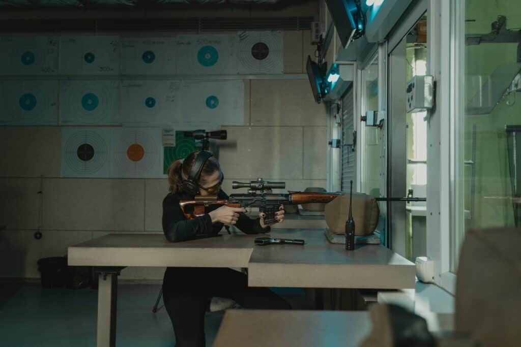 Woman practice shooting in a shooting range in South Dakota