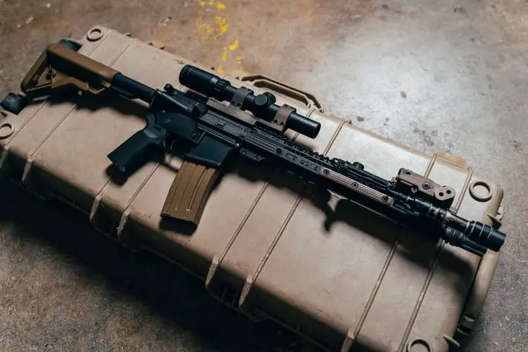 Rifle on top of a gun case
