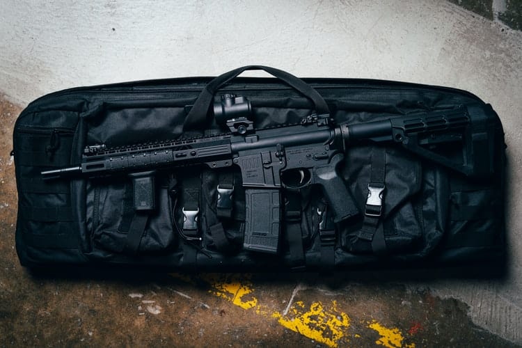 Rifle on top of a bag