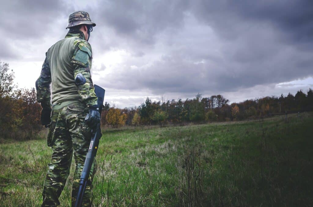 Man holding a rifle