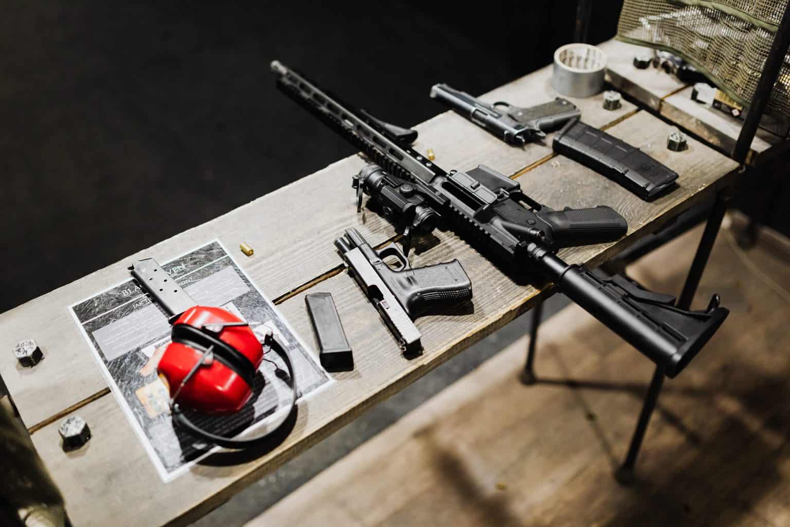 Rifle and gun accessories in a table
