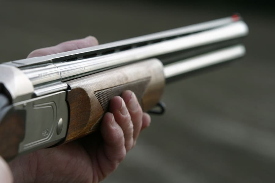 Person holding a gun not needing a gun permit to shoot at a gun range in Colorado
