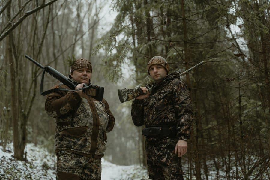 Men wondering if they need a gun permit to shoot at a gun range in Illinois