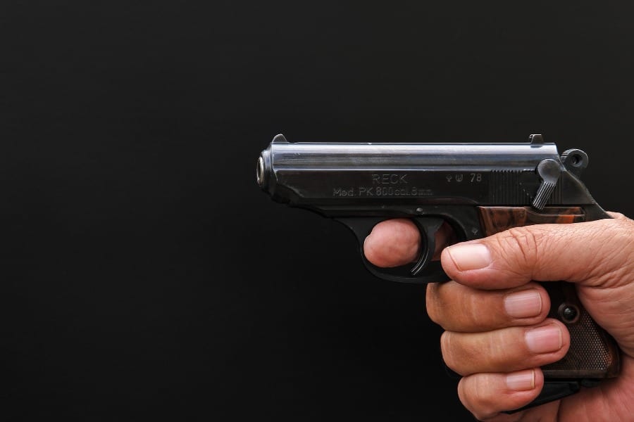 Person holding a handgun