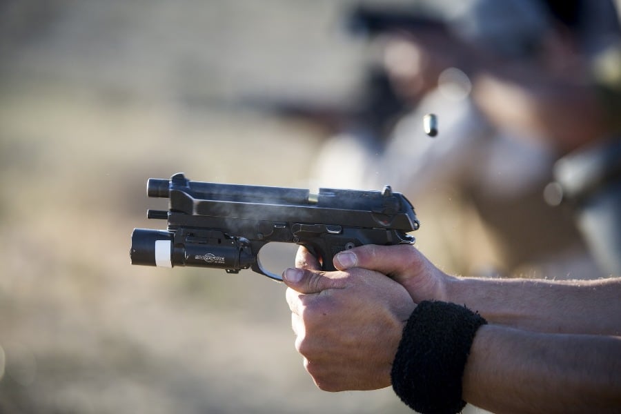 Person firing a gun and not needing a gun permit to shoot at a gun range in Oklahoma