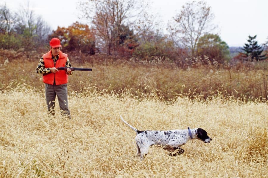 Man holding his gun and not needing a permit to shoot at a gun range in Wisconsin