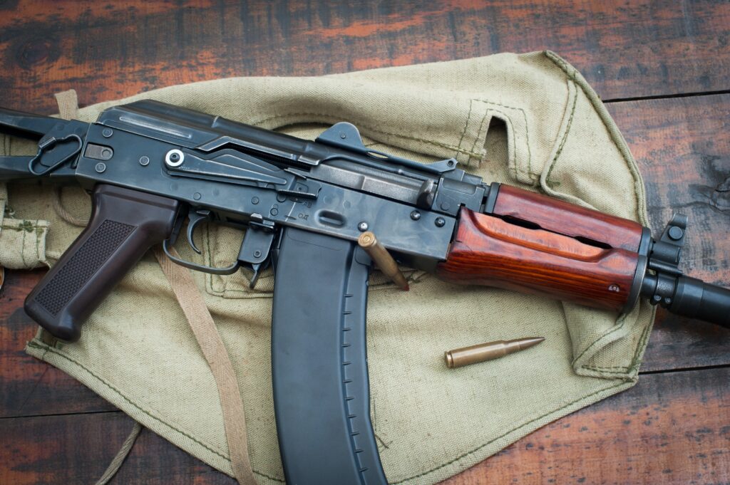 gun with bullets on a table