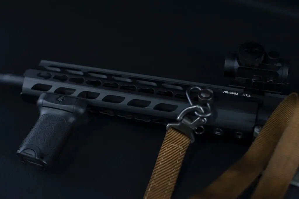 black gun with scope