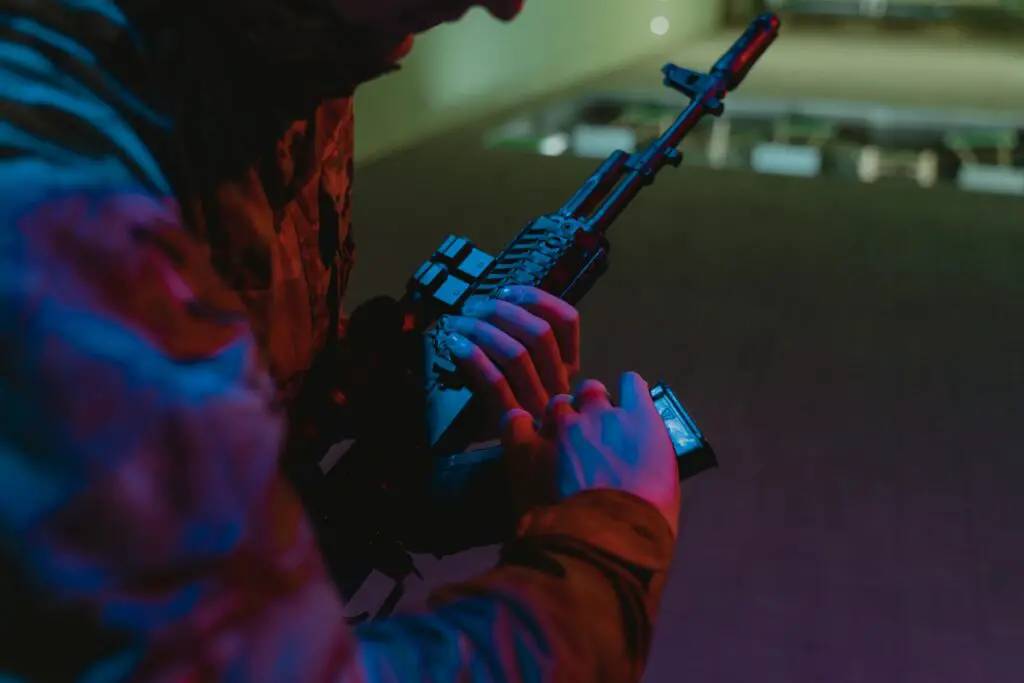 closeup of a man handling a firearm