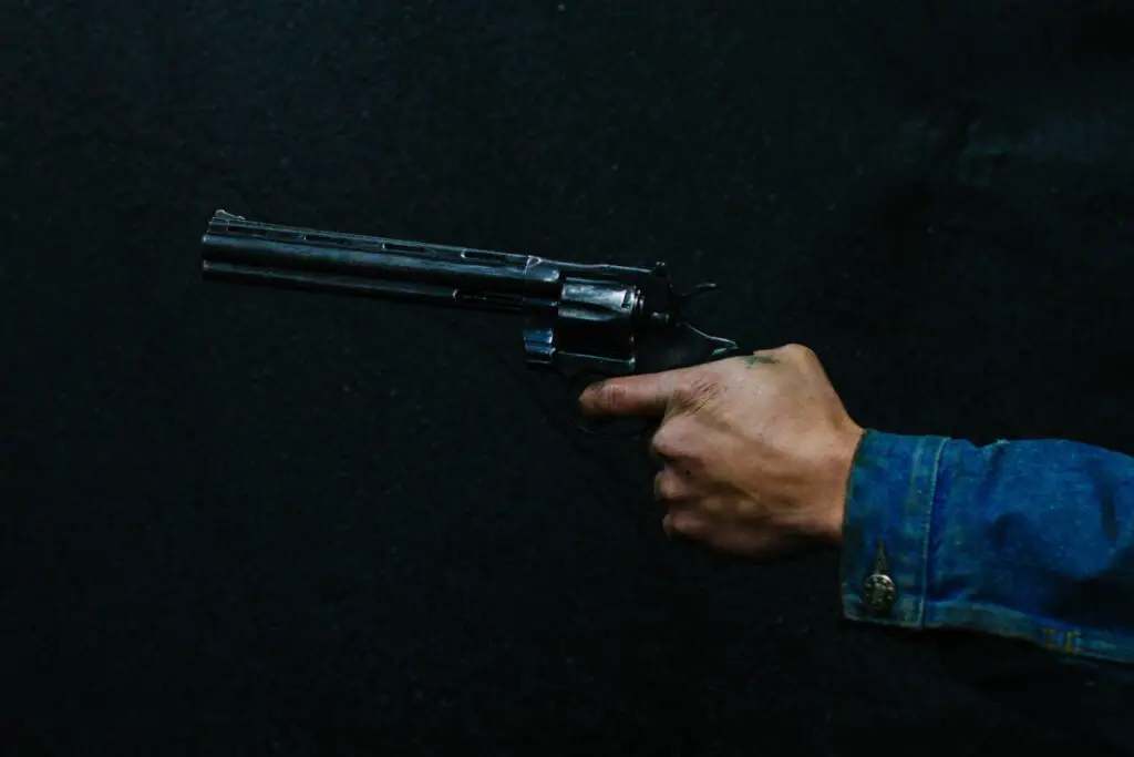 A man holding a revolver