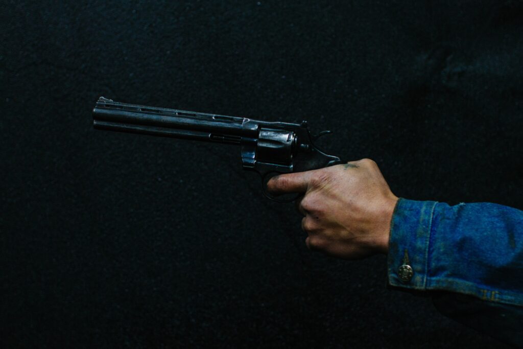 A man holding a revolver