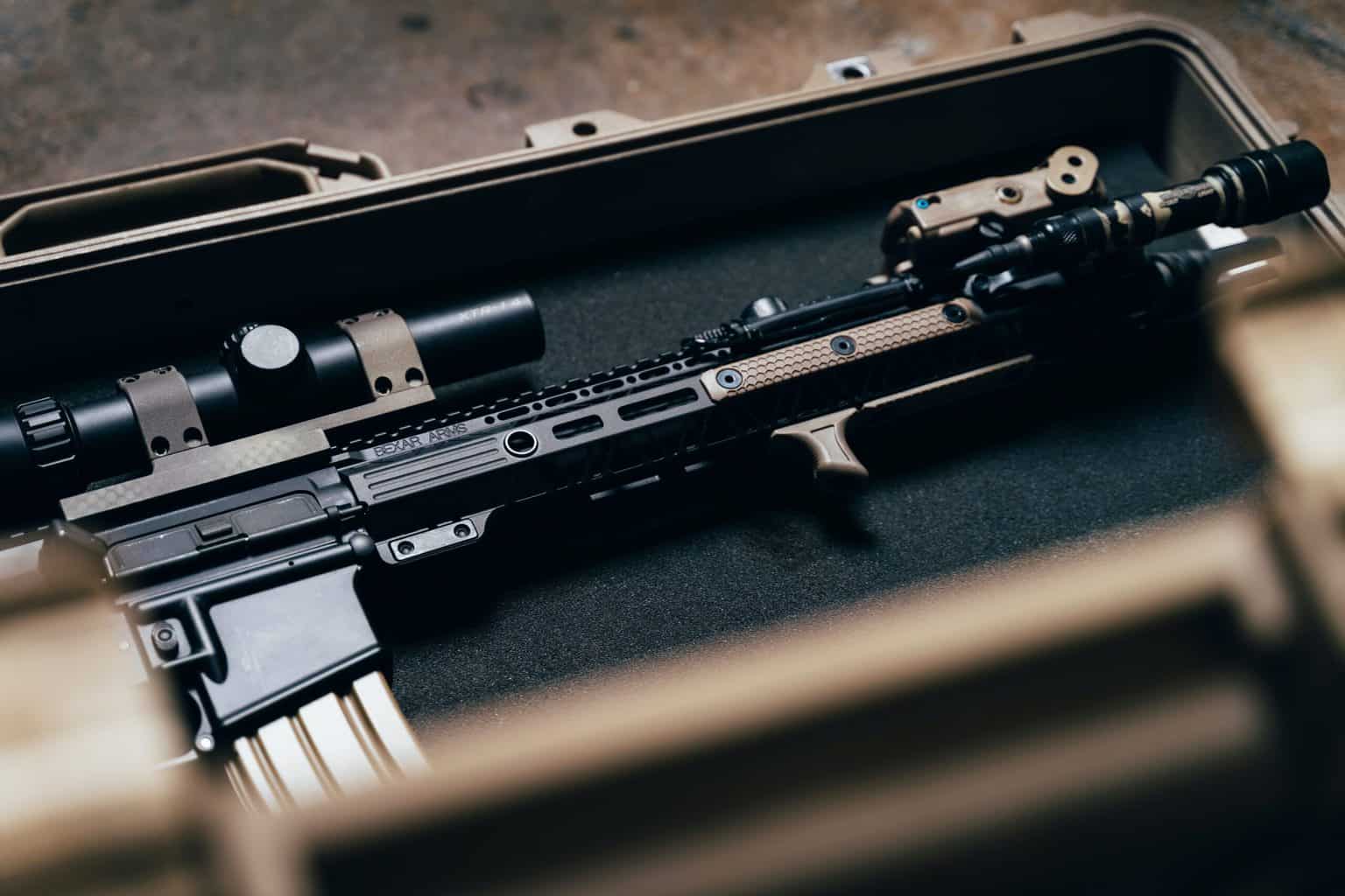 Rifle with a scope inside a case