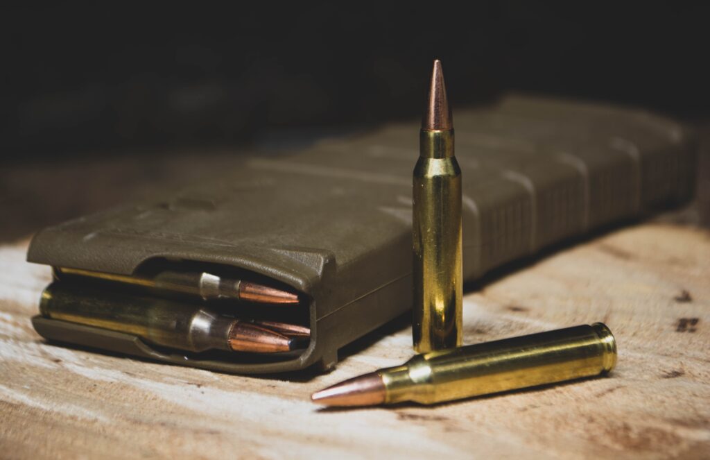 close up shot of bullets and magazine