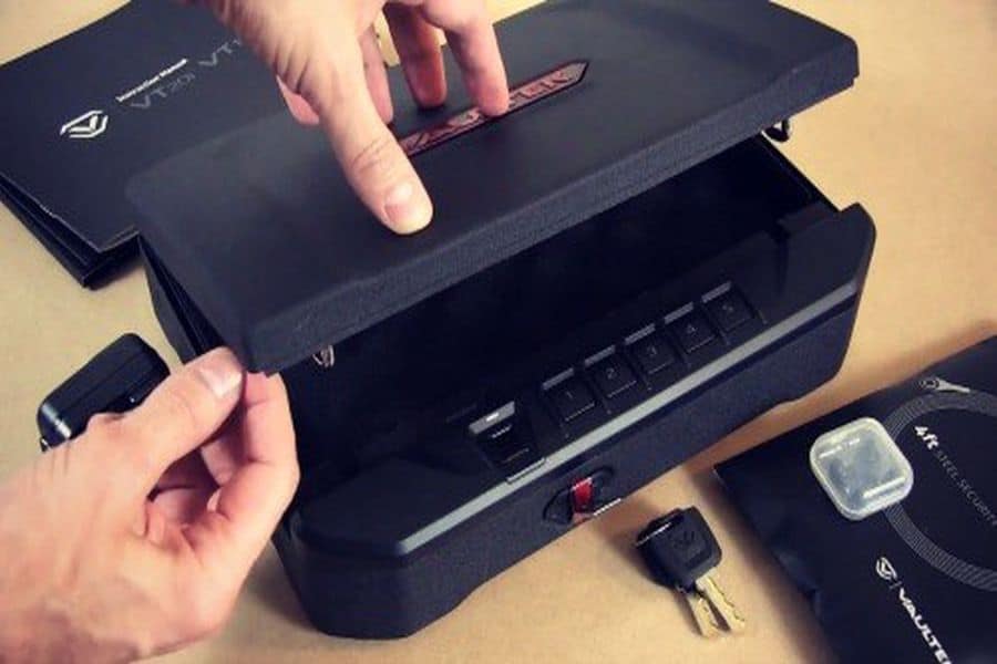 Hand opening a biometric safe