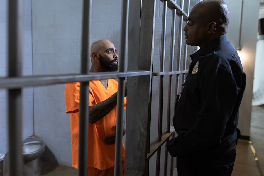 Jail guard talking to a felony