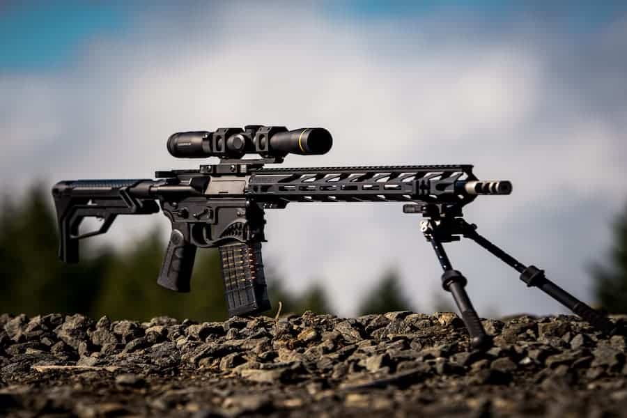 Rifle with bipod on the ground