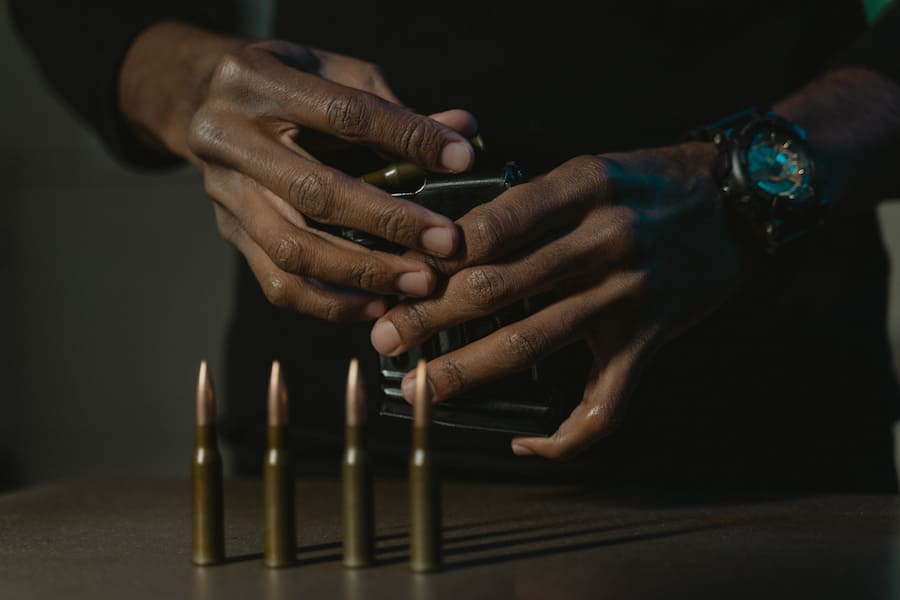 A man reloading bullets