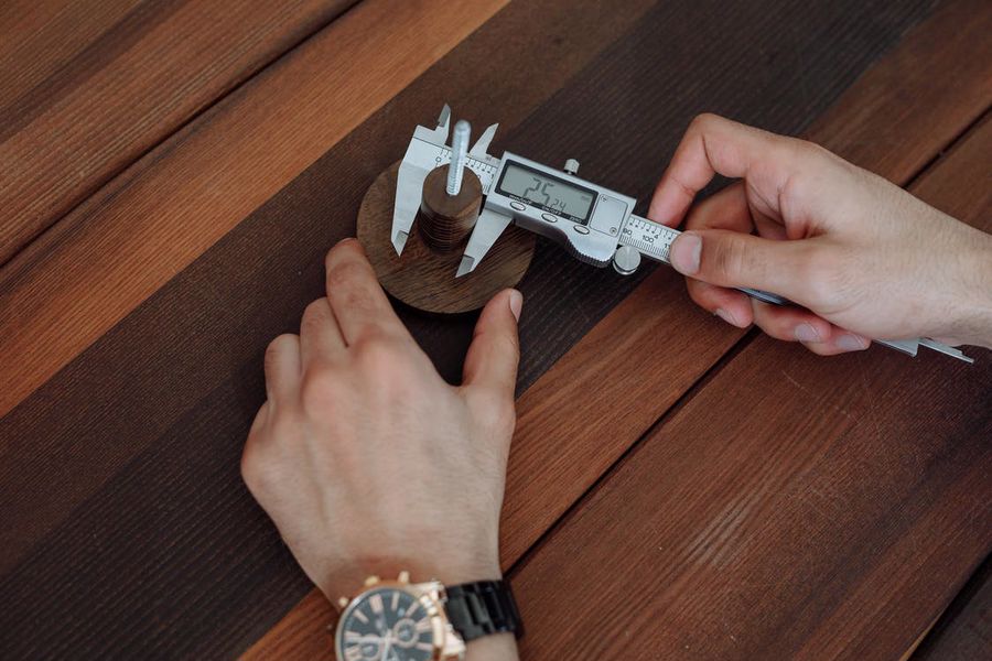 Person using a digital caliper