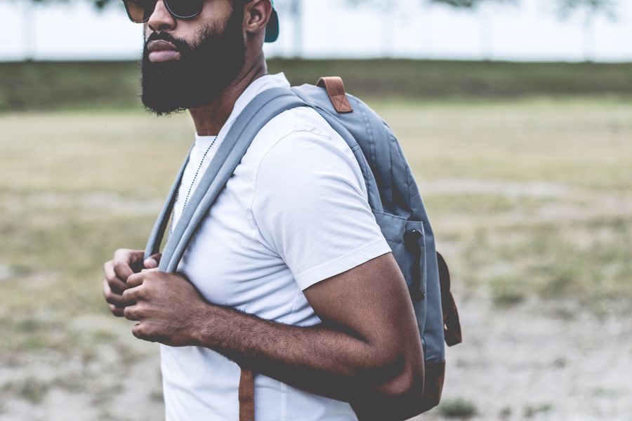 Man with a blue backpack